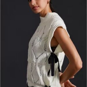Anthropologie Sweater Vest with Black Bow Detail